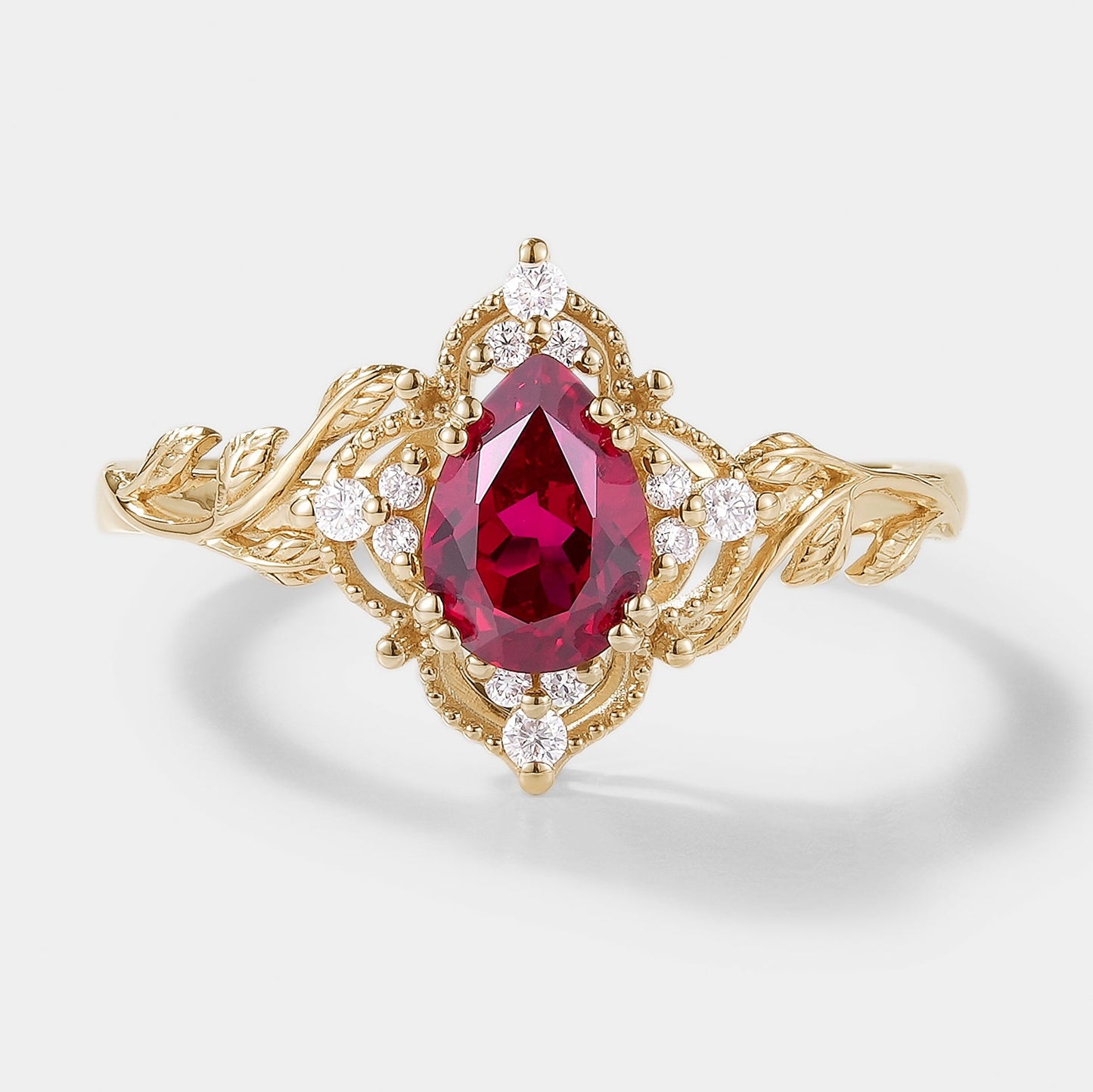 Pear Cut Lab Ruby Ring Nature Inspired Leaf Engagement Ring