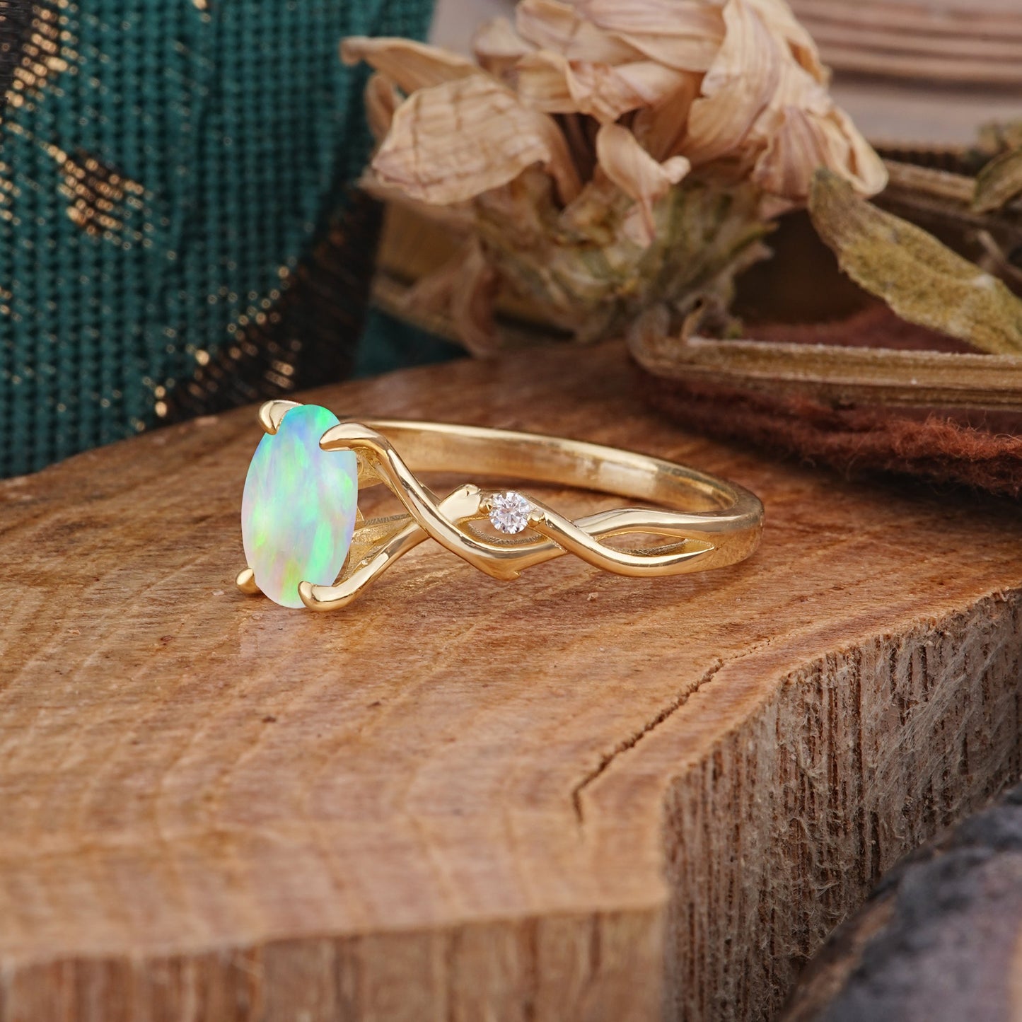 Artistic Twisted Shank Oval Cut Opal Engagement Ring