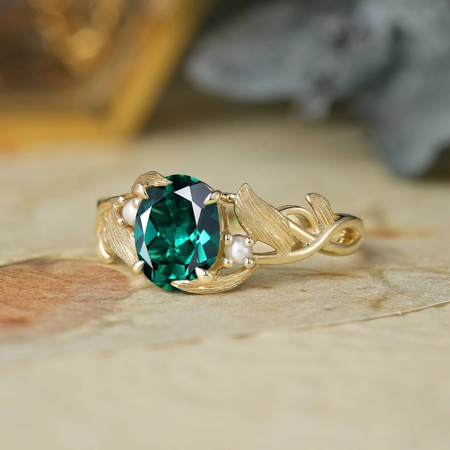 Elegant Oval Cut Emerald Brushed Gold Leaf Ring - Thea