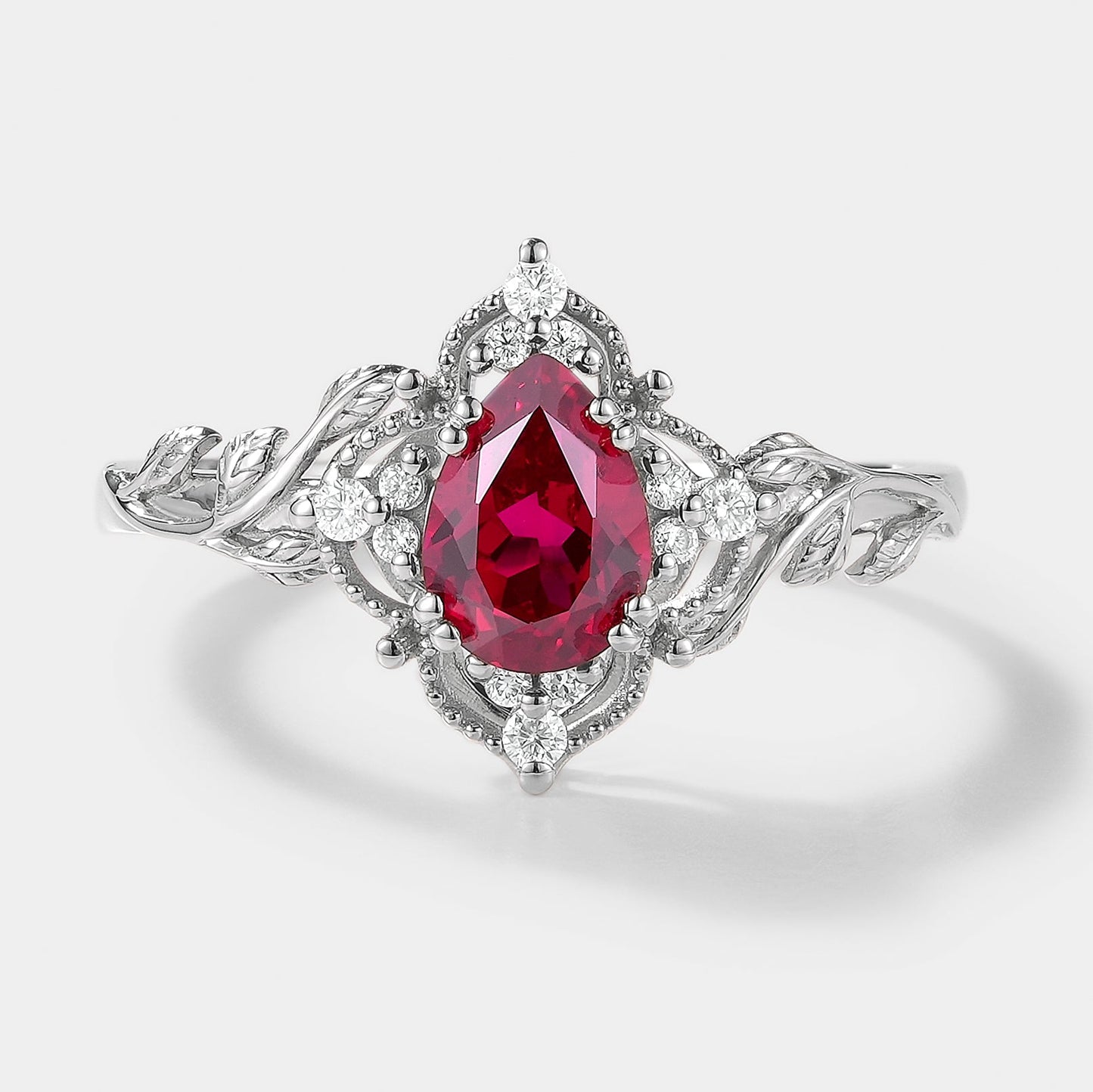 Pear Cut Lab Ruby Ring Nature Inspired Leaf Engagement Ring