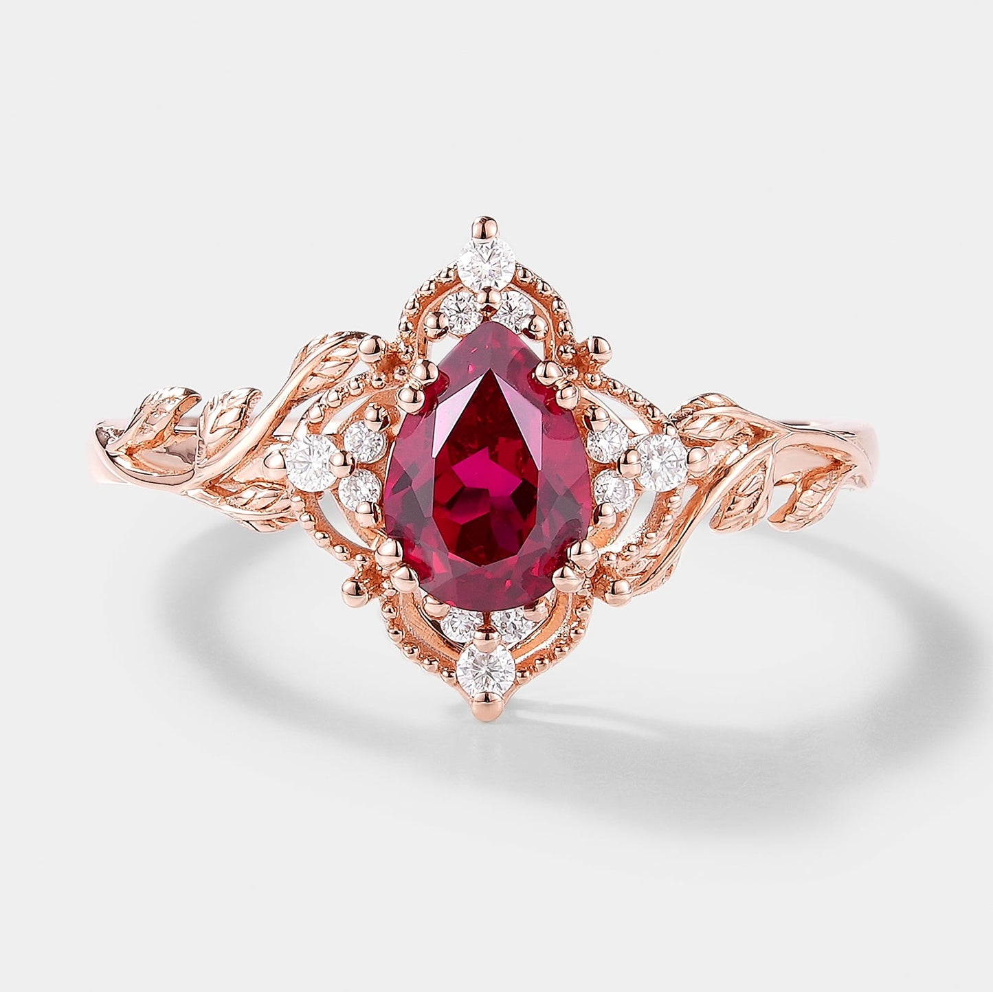 Pear Cut Lab Ruby Ring Nature Inspired Leaf Engagement Ring