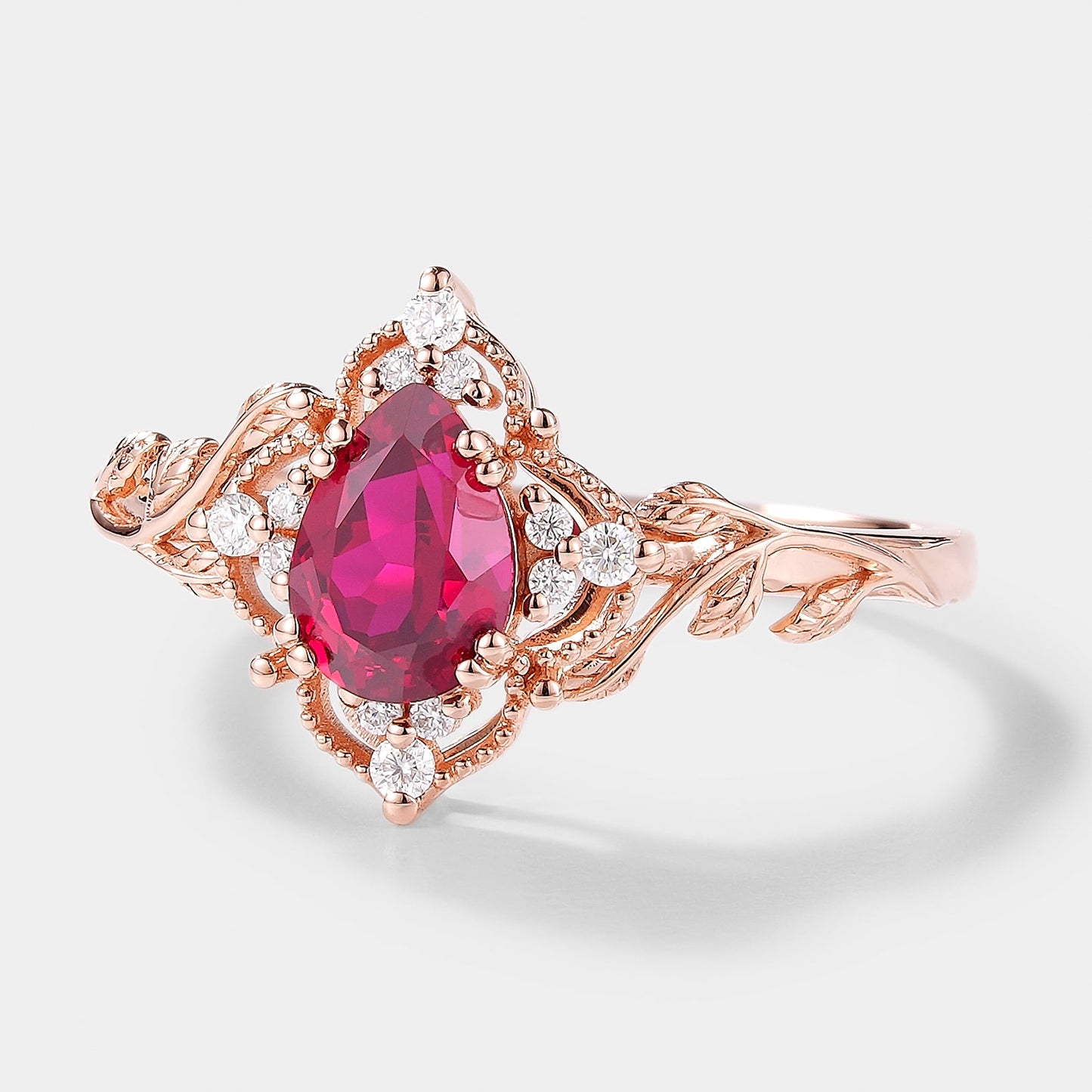 Pear Cut Lab Ruby Ring Nature Inspired Leaf Engagement Ring