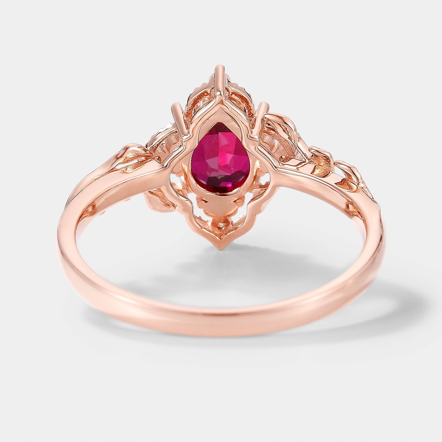 Pear Cut Lab Ruby Ring Nature Inspired Leaf Engagement Ring