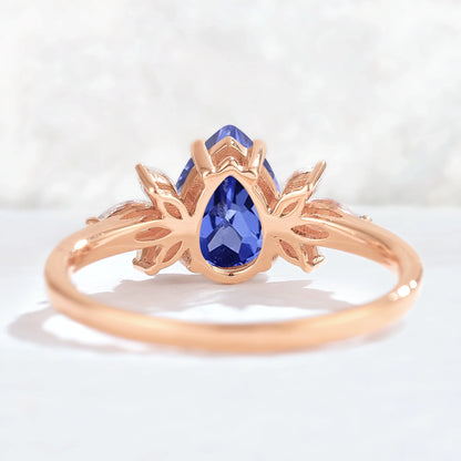 Nature Inspired Pear Cut Cornflower Sapphire with Petal Side Gemstone Ring