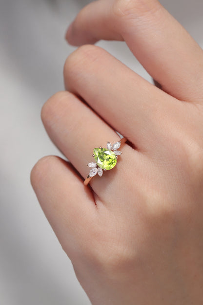 Nature Inspired Pear Cut Peridot with Petal Side Gemstone Ring