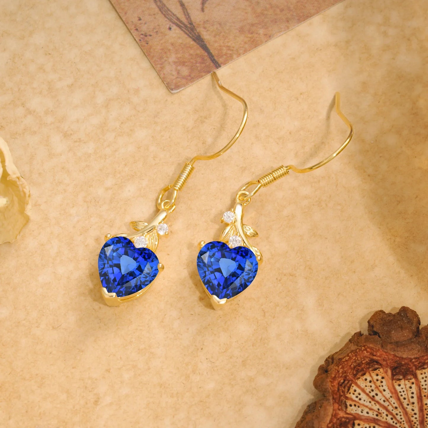 Elegant Heart Shape Sapphire Drop Earrings in Gold with Delicate Leaf Accent