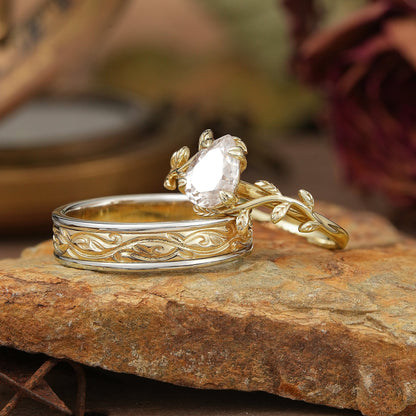 Pear Cut Moissanite Mixed Metal Leaf Inspired Couple Ring Set - Clementine & Moore