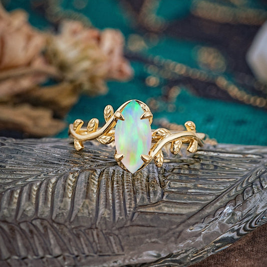 Nature-Inspired Leafy Branch 4-Prong Marquise Opal Engagement Ring