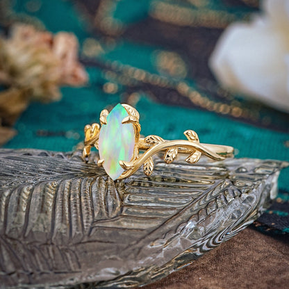 Nature-Inspired Leafy Branch 4-Prong Marquise Opal Engagement Ring