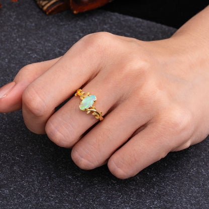 Nature-Inspired Leafy Branch 4-Prong Marquise Opal Engagement Ring