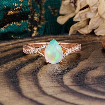 Timeless Vintage 4-Prong Pear-Cut Opal Engagement Ring