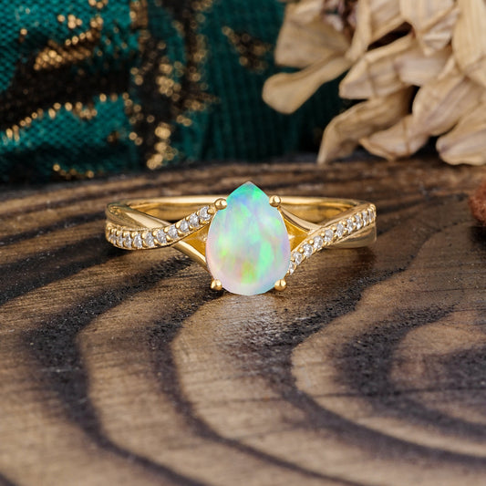 Timeless Vintage 4-Prong Pear-Cut Opal Engagement Ring
