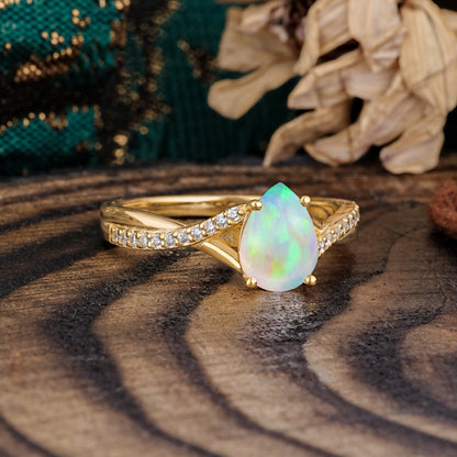 Timeless Vintage 4-Prong Pear-Cut Opal Engagement Ring