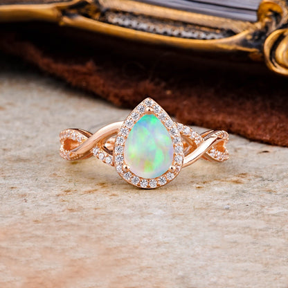 Dazzling 3 - Prong Pear-Cut Opal Engagement Ring