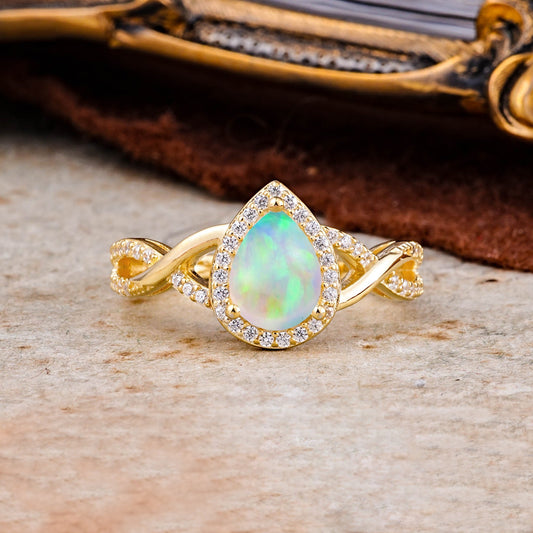Dazzling 3 - Prong Pear-Cut Opal Engagement Ring