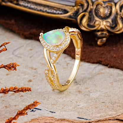 Dazzling 3 - Prong Pear-Cut Opal Engagement Ring