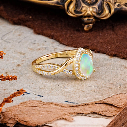 Dazzling 3 - Prong Pear-Cut Opal Engagement Ring