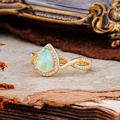 Dazzling 3 - Prong Pear-Cut Opal Engagement Ring