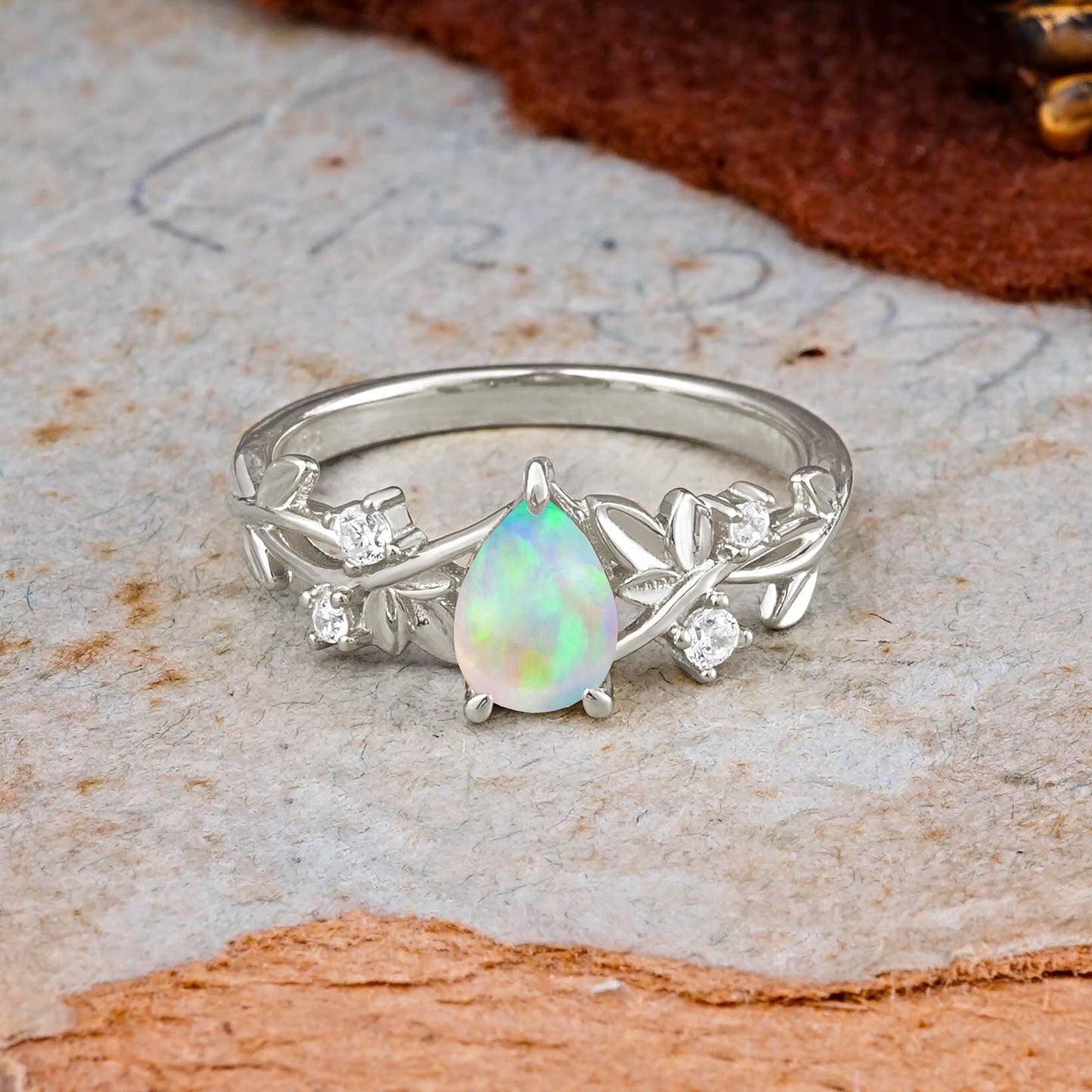 Haute Nature Inspired 4-Prong Oval Opal Engagement Ring