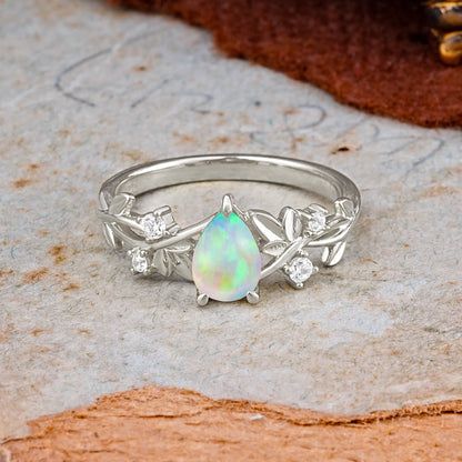 Haute Nature Inspired 4-Prong Oval Opal Engagement Ring