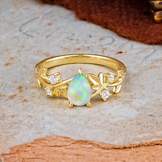 Haute Nature Inspired 4-Prong Oval Opal Engagement Ring