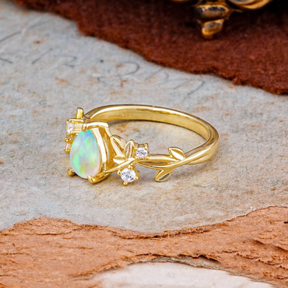 Haute Nature Inspired 4-Prong Oval Opal Engagement Ring