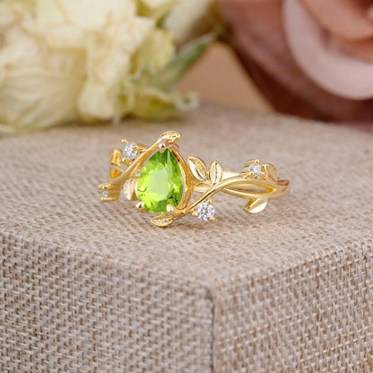 Branch-Inspired 3-Prong Pear-Cut Peridot Engagement Ring