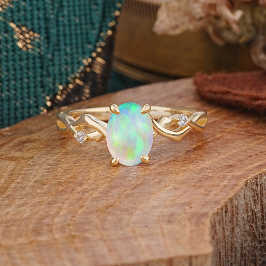 Artistic Twisted Shank Oval Cut Opal Engagement Ring