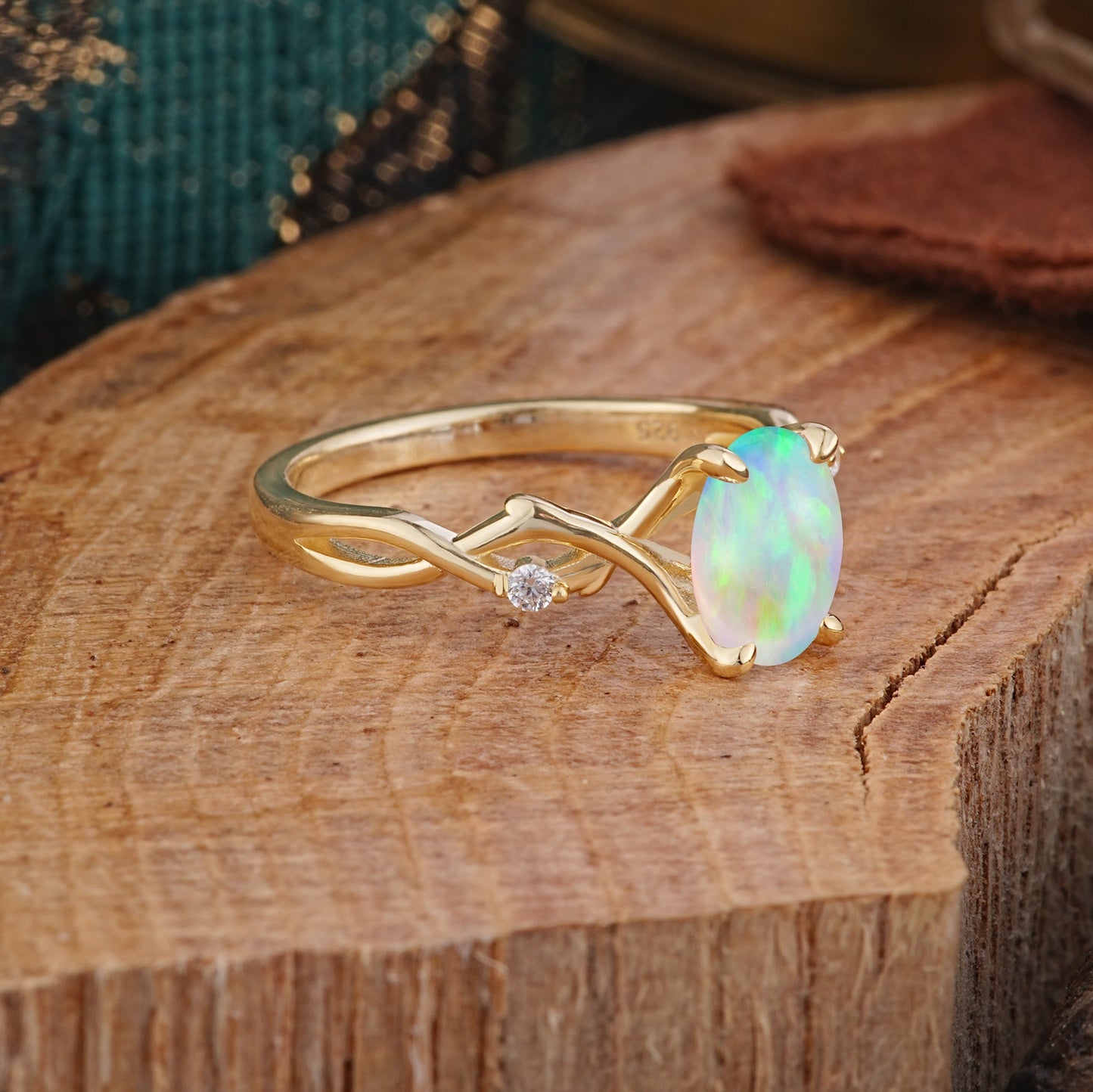 Artistic Twisted Shank Oval Cut Opal Engagement Ring