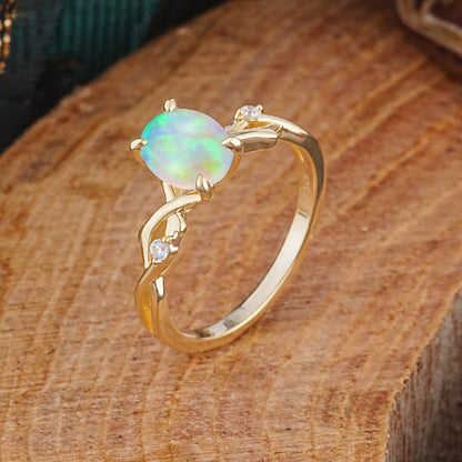 Artistic Twisted Shank Oval Cut Opal Engagement Ring