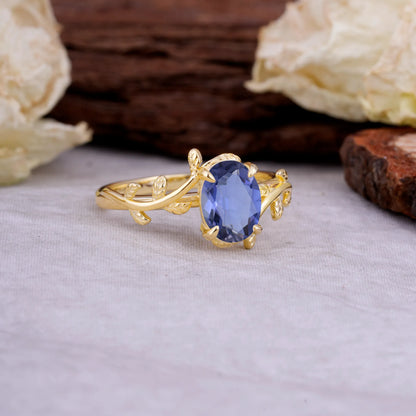 Nature Inspired 4 Prong Oval Cut Tanzanite Wedding Ring
