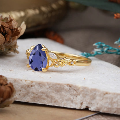 Romantic 4-Prong Pear-Cut Tanzanite Engagement Ring