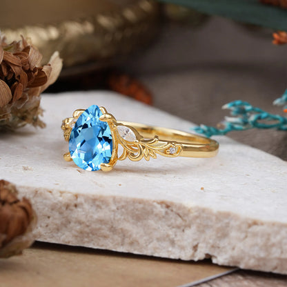 Romantic 4-Prong Pear-Cut Aquamarine Engagement Ring