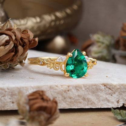 Romantic 4-Prong Pear-Cut Emerald Engagement Ring