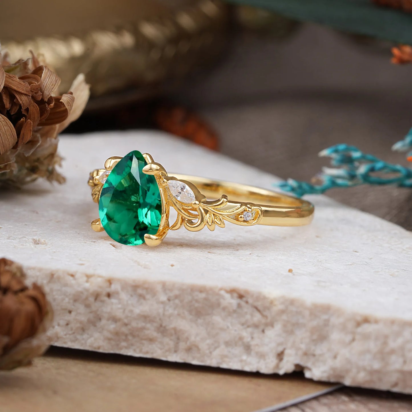 Romantic 4-Prong Pear-Cut Emerald Engagement Ring