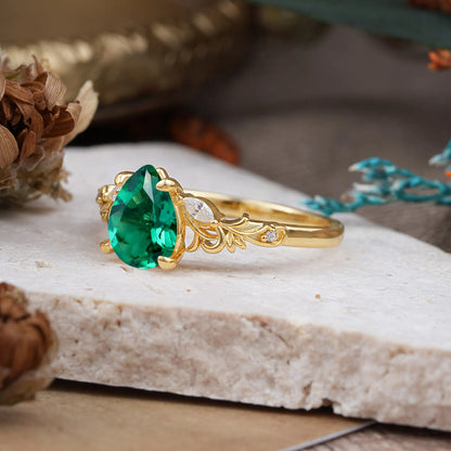 Romantic 4-Prong Pear-Cut Emerald Engagement Ring