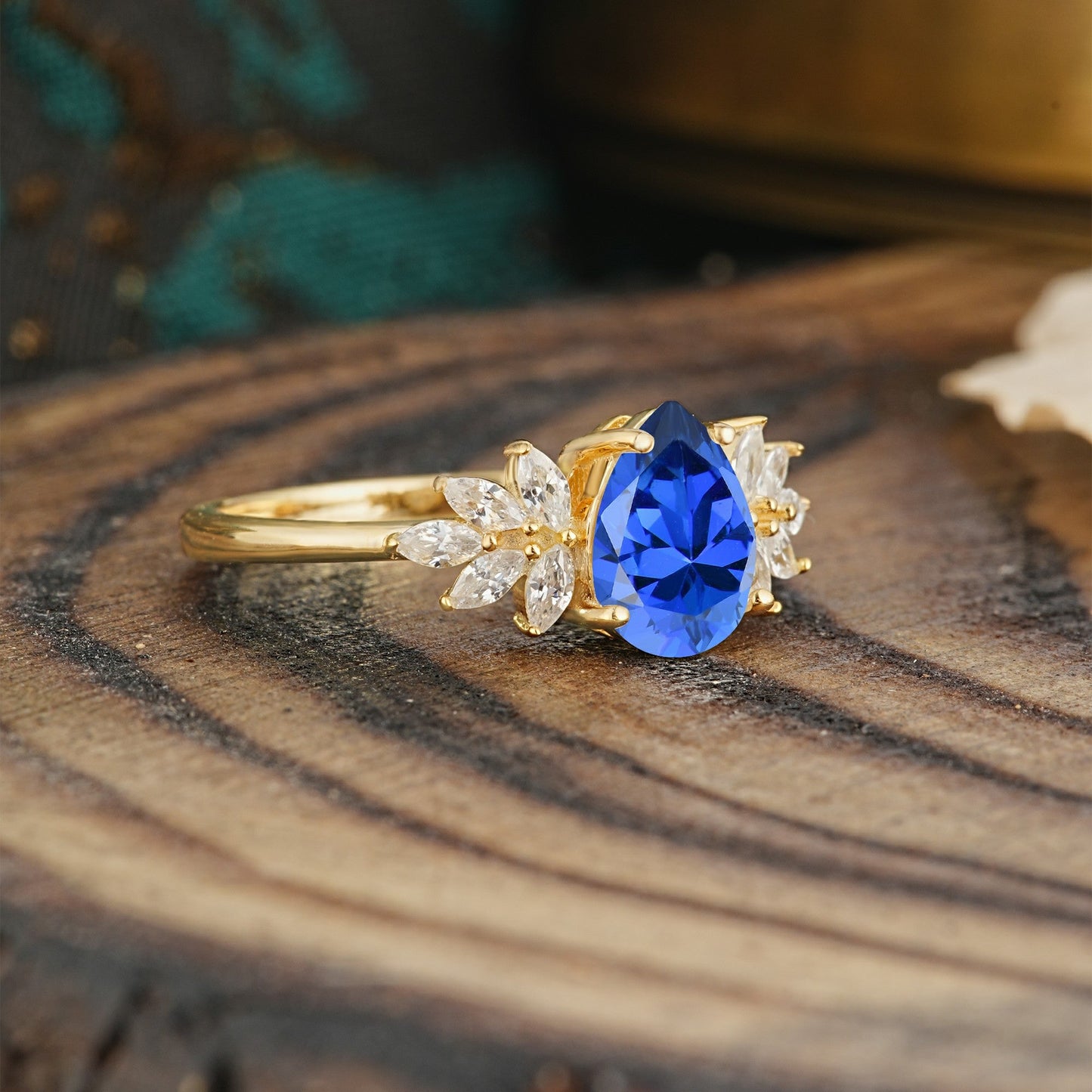 Vintage Floral Pear Cut Sapphire Engagement Ring