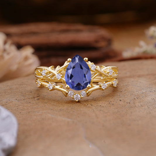 Nature-Inspired Pear-Cut Tanzanite Bridal Ring Set