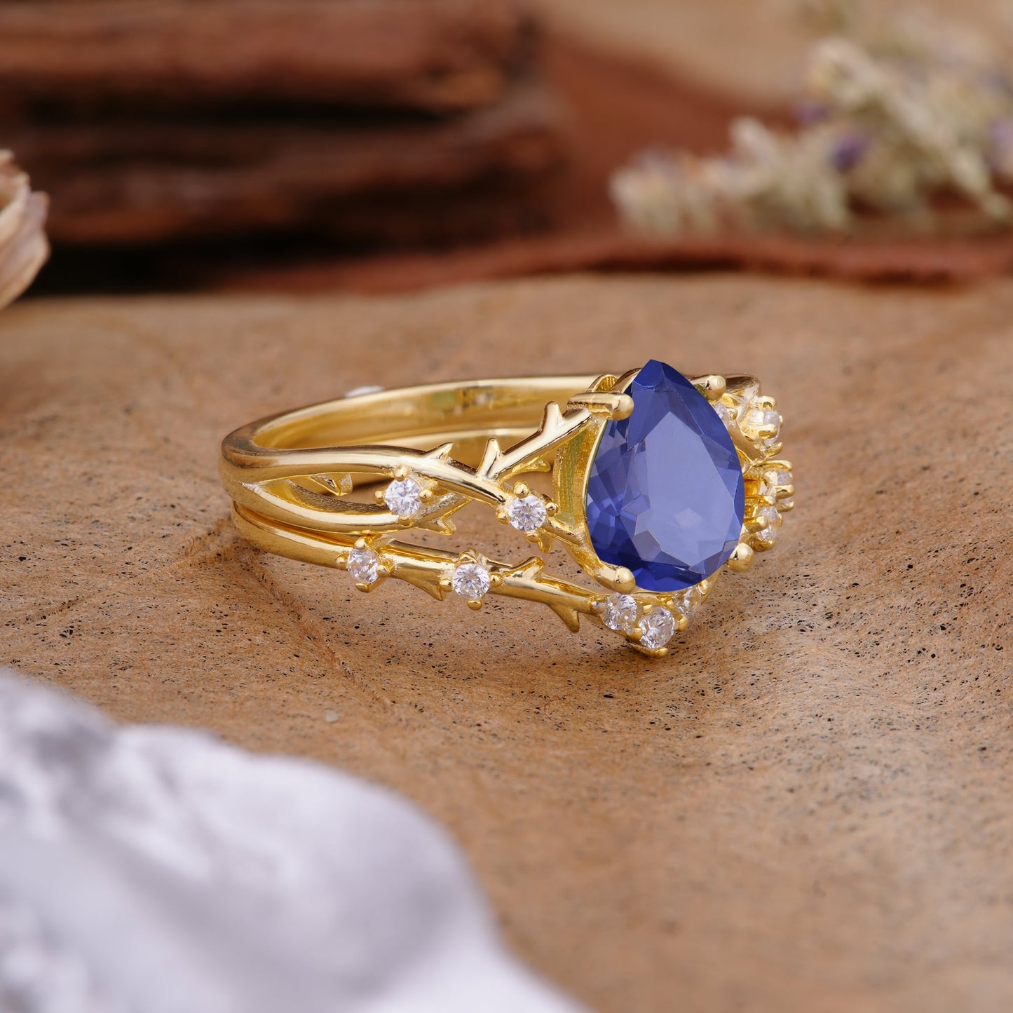 Nature-Inspired Pear-Cut Tanzanite Bridal Ring Set