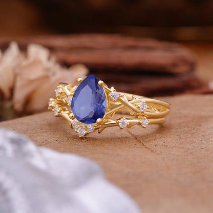 Nature-Inspired Pear-Cut Tanzanite Bridal Ring Set