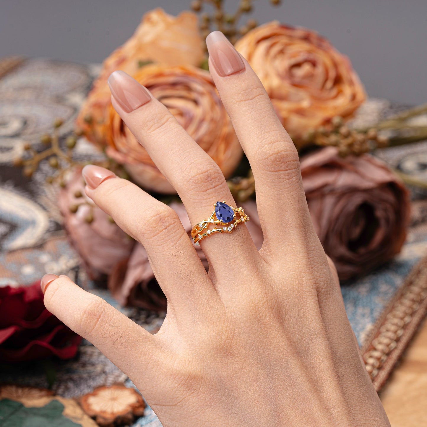 Nature-Inspired Pear-Cut Tanzanite Bridal Ring Set