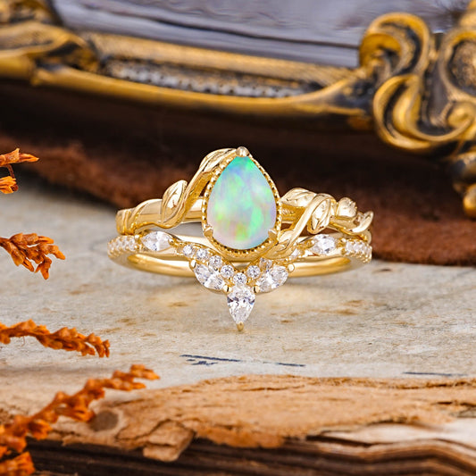 Nature-Inspired 3-Prong Oval-Cut Opal Bridal Ring Set with Vine Accents