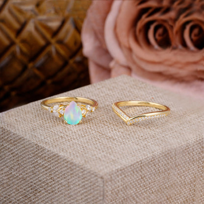 Luxurious Vintage-Inspired 4-Prong Pear-Cut Opal Engagement Ring Set