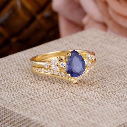 Luxurious Vintage-Inspired 4-Prong Pear-Cut Tanzanite Engagement Ring Set