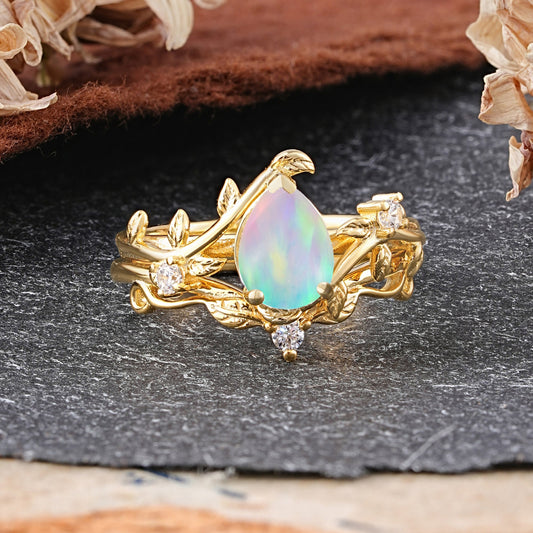 Elegant 3 - Prong Pear - Cut Opal Bridal Ring Set