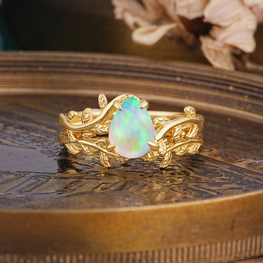Artistic Vine  Themed 4 - Prong Pear Cut Opal Bridal Ring Set