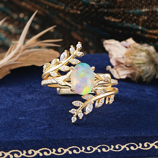 Delicate Leaf Embellished 4 - Prong Oval - Cut Opal Bridal Ring Set