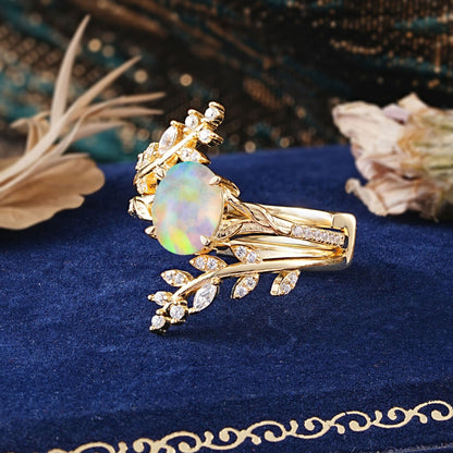 Delicate Leaf Embellished 4 - Prong Oval - Cut Opal Bridal Ring Set