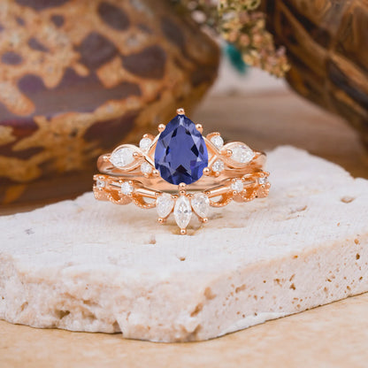 6 Prong Romantic Vine Themed Pear Cut Tanzanite Rings