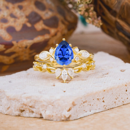 6 Prong Romantic Vine Themed Pear Cut Sapphire Rings